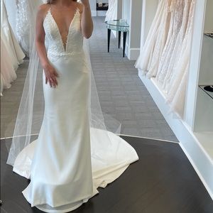 Never before worn wedding dress designer is ines Di Santo “cara” size 10